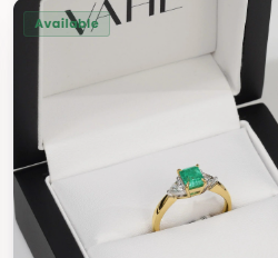 Radiant-cut natural emerald ring